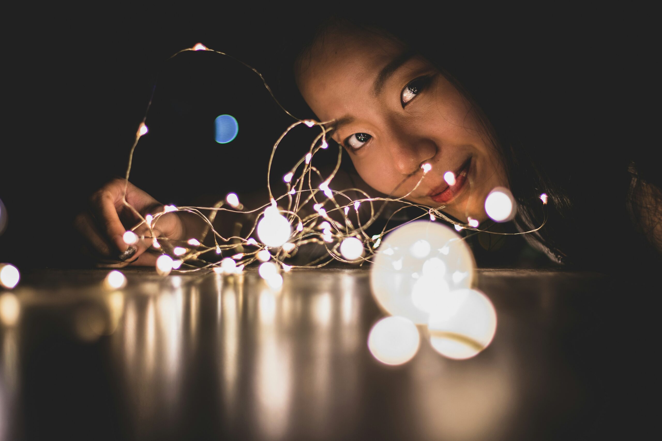 Image of a person looking down a chain of a string of lights | Boomi SAP