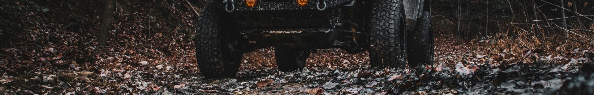 Image of a Toyota 4x4 driving powerfully through a muddy forest | Boomi data integration